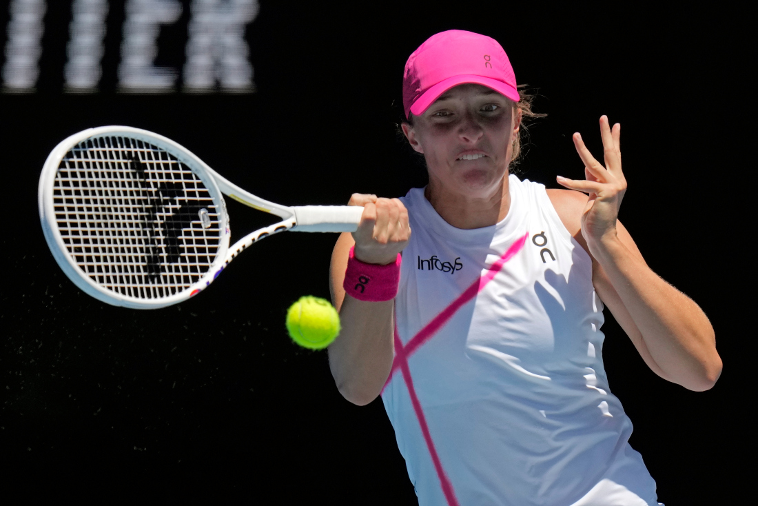 Top-ranked Swiatek is into Australian Open 2nd round, beats former champion Kenin