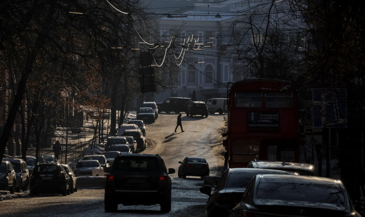 A man crosses a street, amid Russia's attack on Ukraine, in central Kyiv, Ukraine January 16, 2024. (Reuters)