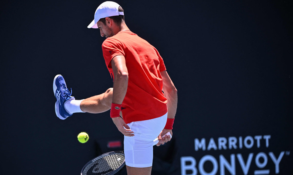 Serbia's Novak Djokovic hits a shot during a practice session on day three of the Australian Open tennis tournament in Melbourne on Tuesday. (AFP)