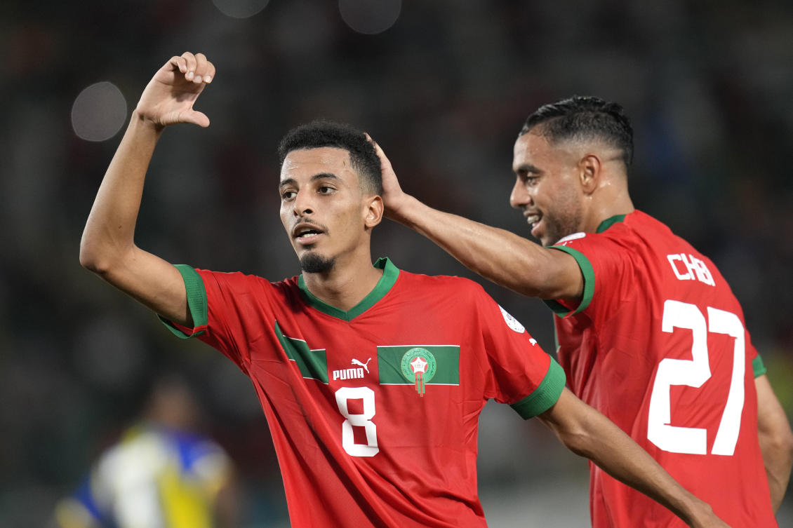 Morocco’s Azzedine Ounahi, left, celebrates with Mohamed Chibi after scoring his side’s second goal during their African Cup of Nations Group F match against Tanzania at the Laurent Pokou stadium in San Pedro on Jan. 17, 2024. (AP)