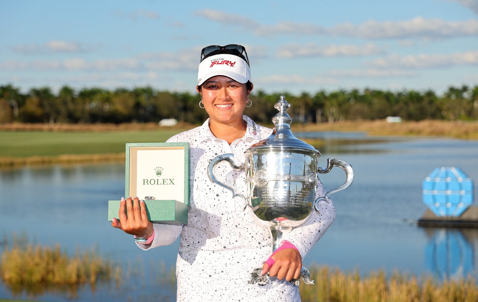 Lilia Vu of the US poses with the Rolex Player of the Year trophy and her Rolex watch after the CME Group Tour Championship at Tiburon Golf Club on Nov. 19, 2023 in Naples, Florida. (File AFP)