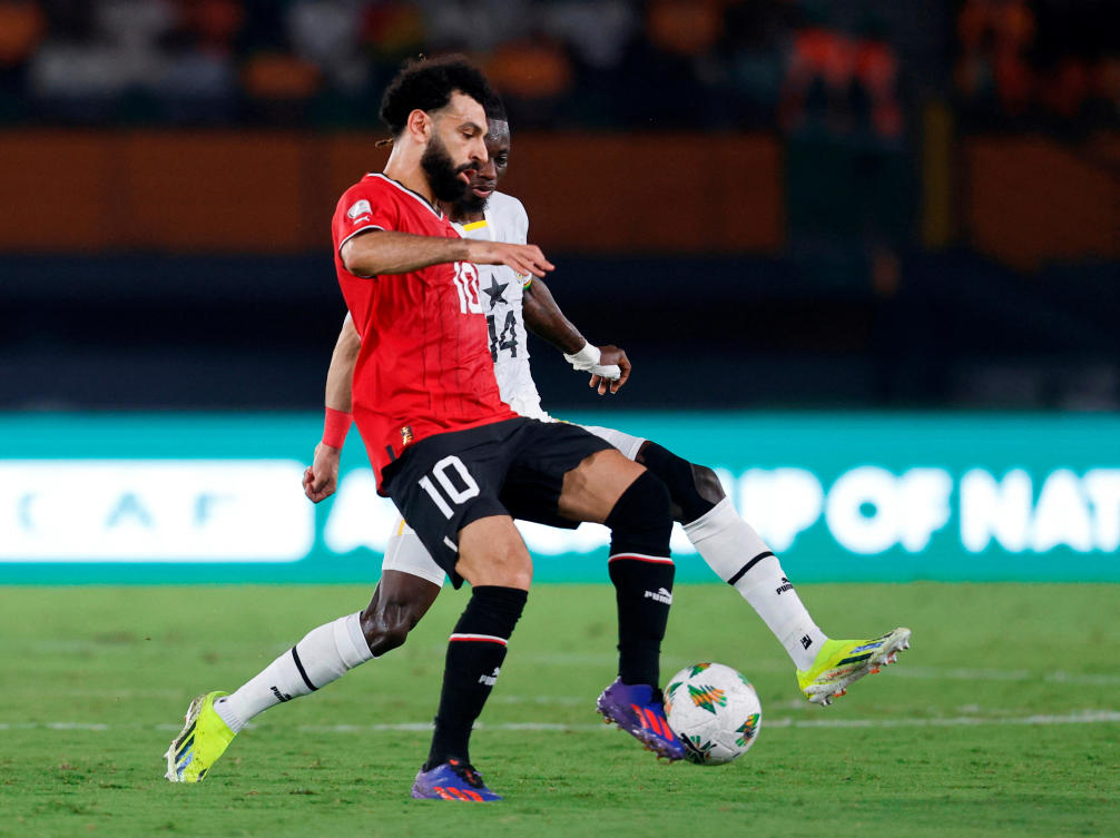 Egypt’s Mohamed Salah in action with Ghana’s Gideon Mensah during their Africa Cup of Nations — Group B — match at Felix Houphouet Boigny Stadium, Abidjan on Jan. 18, 2024. (Reuters)
