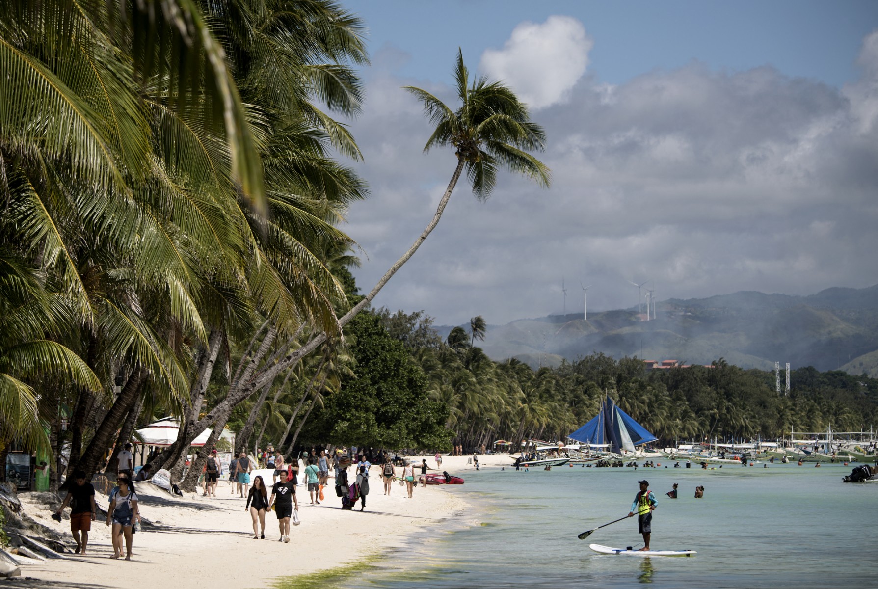 Tourists are seen at the white sands beach of Boracay, Philippines. (File/AFP)