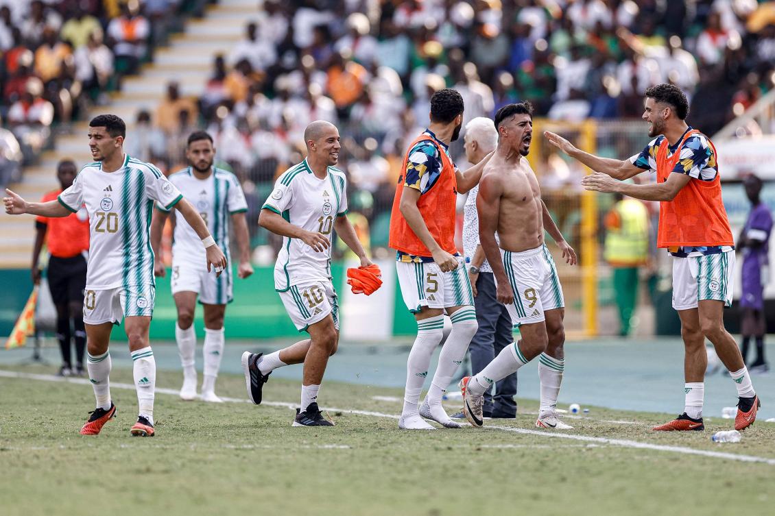 Algeria’s forward Baghdad Bounedjah (2R) celebrates with teammates after scoring his team’s second goal during their Africa Cup of Nations (CAN) 2024 group D match against Burkina Faso at Stade de la Paix in Bouake on Jan. 20, 2024. (AFP)