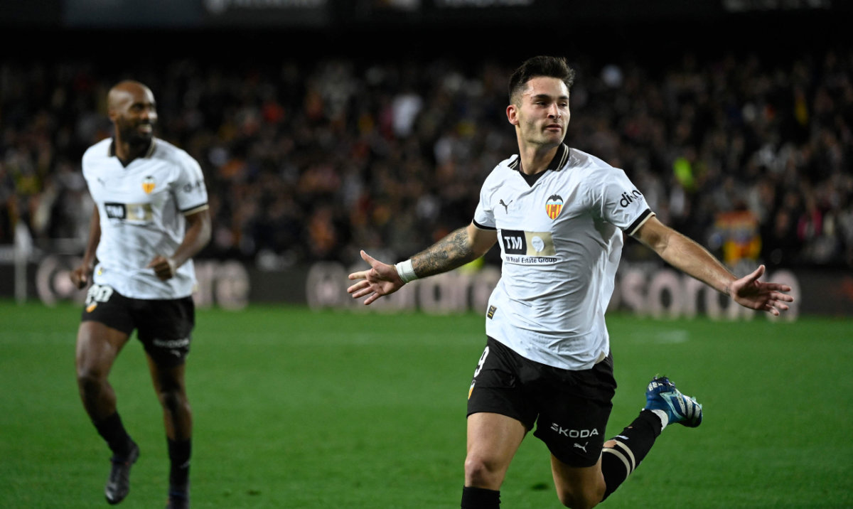 Valencia's Spanish forward Hugo Duro celebrates scoring his team's first goal during the Spanish League football match between Valencia CF and Athletic Club Bilbao at the Mestalla stadium in Valencia on Jan. 20, 2024. (AFP)