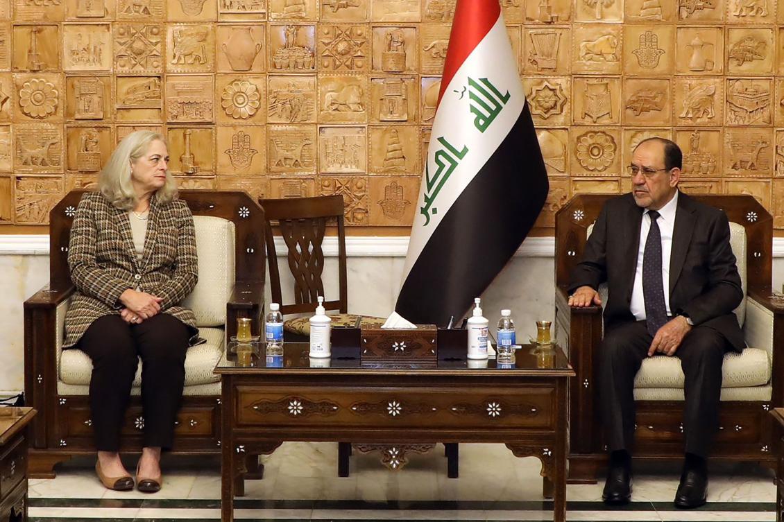 Former Iraqi prime minister Nuri al-Maliki (R) meeting with Ambassador Alina Romanowski in Baghdad. (AFP)