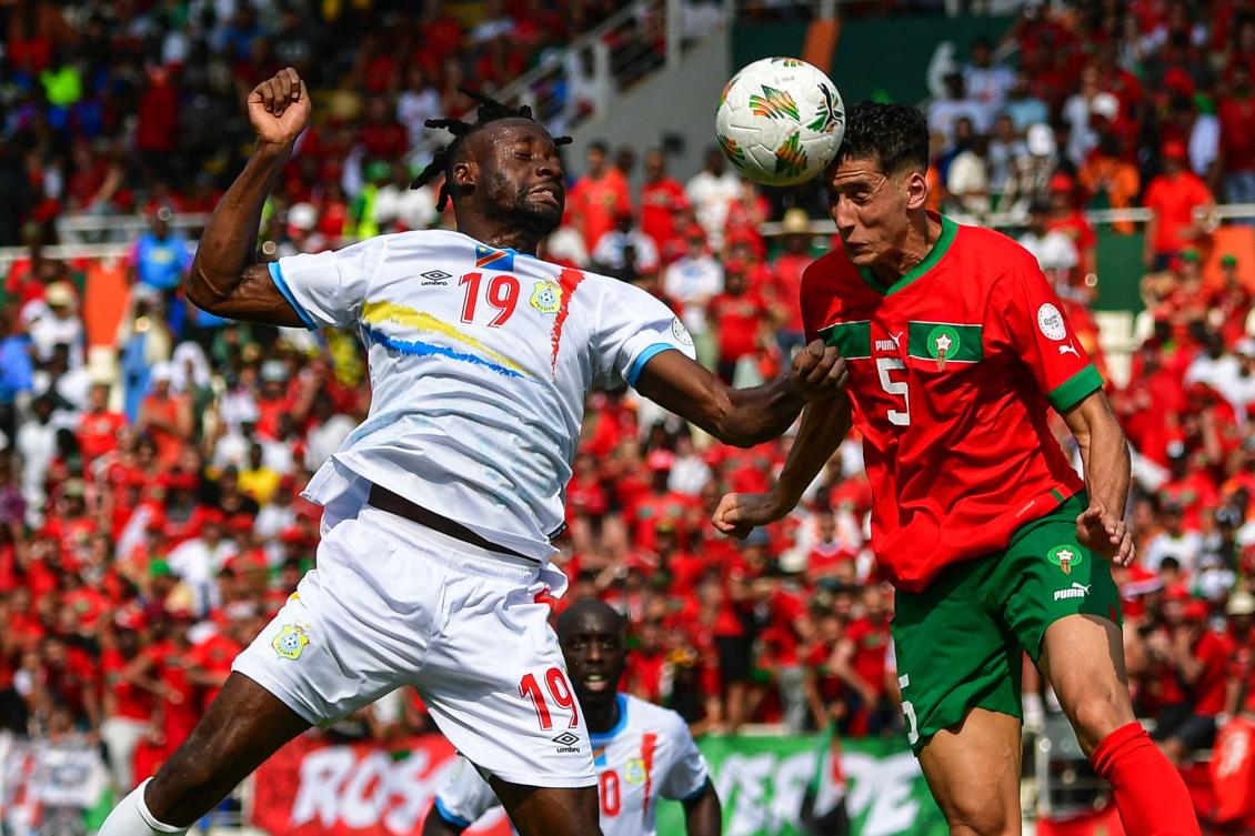 DR Congo’s forward #19 Fiston Mayele (L) fights for the ball with Morocco’s defender #5 Nayef Aguerd during the Africa Cup of Nations (CAN) 2024 group F football match between Morocco and DR Congo at Stade Laurent Pokou in San Pedro on January 21, 2024. (AFP)