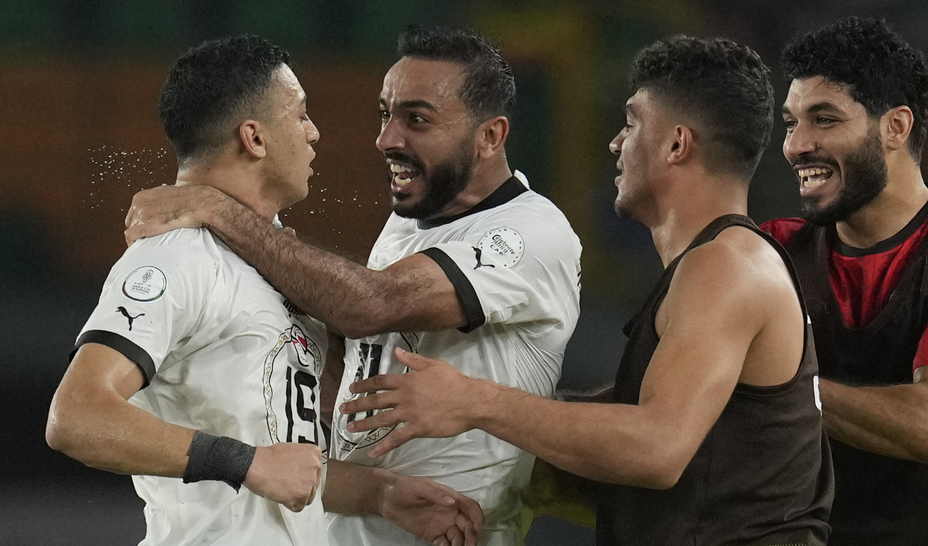 Egypt’s Mostafa Mohamed, left, celebrates with Kahraba, 2nd left after scoring his side’s second goal during the African Cup of Nations Group B match against Cape Verde at the Felix Houphouet Boigny stadium in Abidjan, Ivory Coast, Monday, Jan. 22, 2024. (AP)