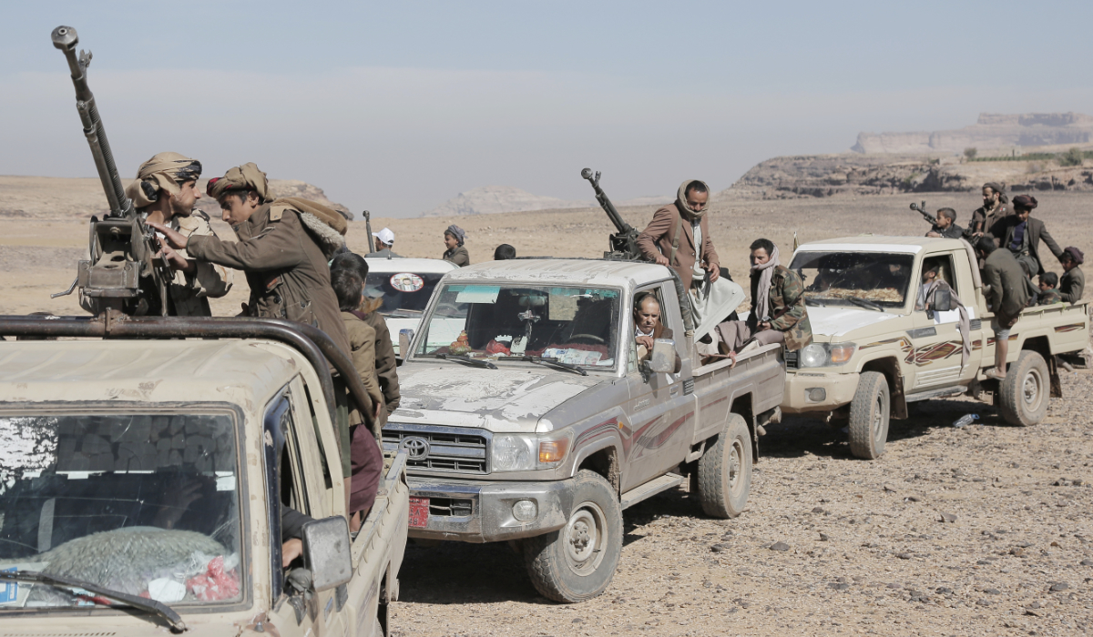 Houthi fighters attend a rally of support for the Palestinians in the Gaza Strip and against the US strikes on Yemen outside Sanaa on Monday, Jan. 22, 2024. (AP)