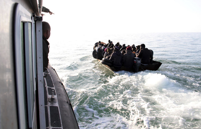 Two teenage would-be migrants from Tunisia died after hiding in a refrigerated container on a ship traveling to Europe, the country’s civil protection department said on Tuesday. (AP/File)
