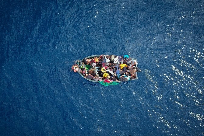 At least seven people have been hospitalized after Cypriot police rescued 60 Syrian migrants found aboard a rickety wooden boat 55 kilometers off the island nation’s southeastern tip, authorities said Wednesday. (AFP/File)