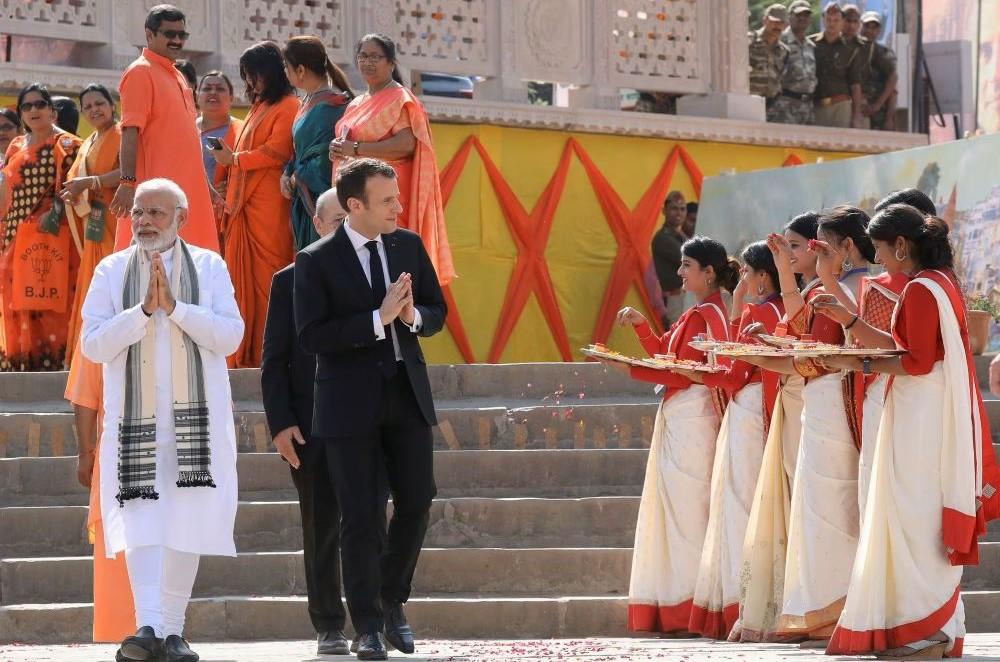 Emmanuel Macron and Narendra Modi in Varanasi, India, Mar. 12, 2018. (Reuters)