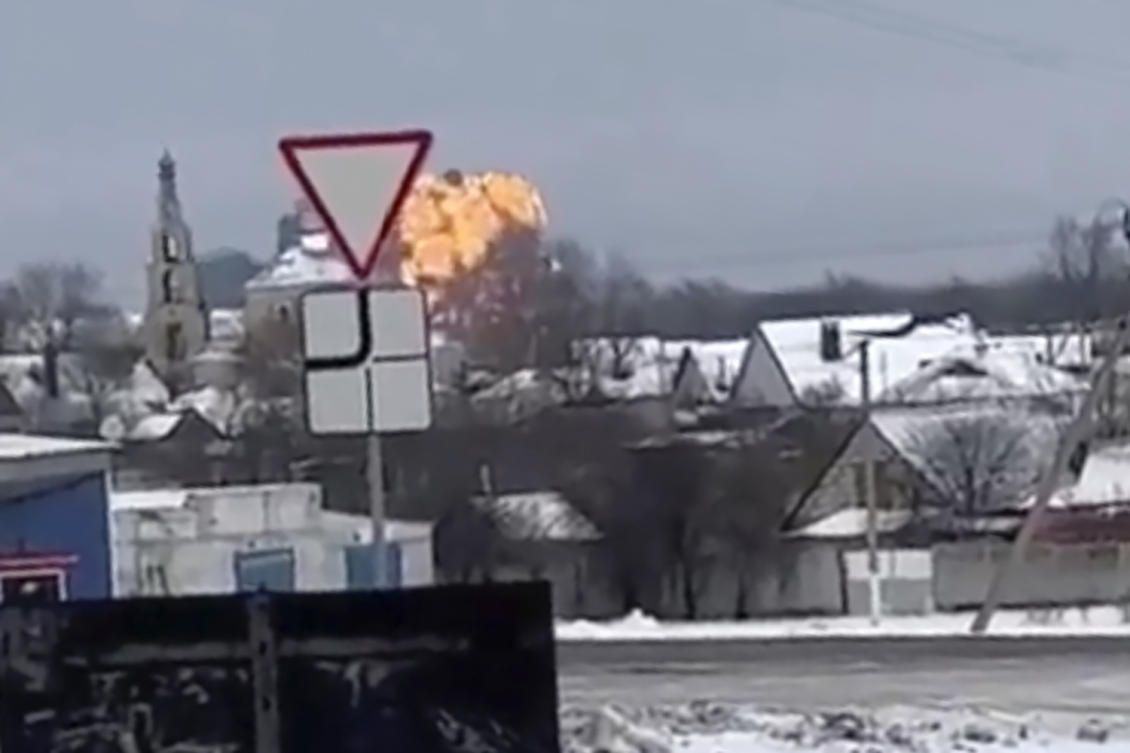A frame grab from a UGC video shows flames rising from the scene of a military planethat rashed at a residential area near Yablonovo, Belgorod region on Jan. 23, 2024. (Validated UGC video via AP)