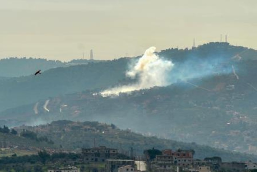 Smoke billows over the southern Lebanese village of Kfar Kila, near the border with Israel, during Israeli bombardment on Jan, 22, 2024. (AFP)