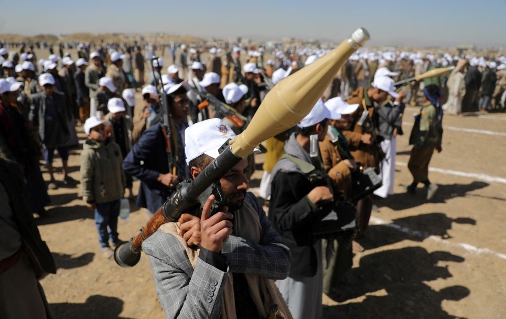 A Houthi fighter brandishes an RPG launcher during a rally aimed at exhibiting defiance over US-led strikes and in support of Palestinians in Gaza, near Sanaa, Yemen, Jan. 25, 2024. (Reuters)