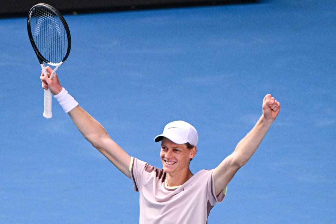 Jannik Sinner broke Novak Djokovic’s serve twice in each of the first two sets but missed a match point in the third set victory on Friday. (AFP)
