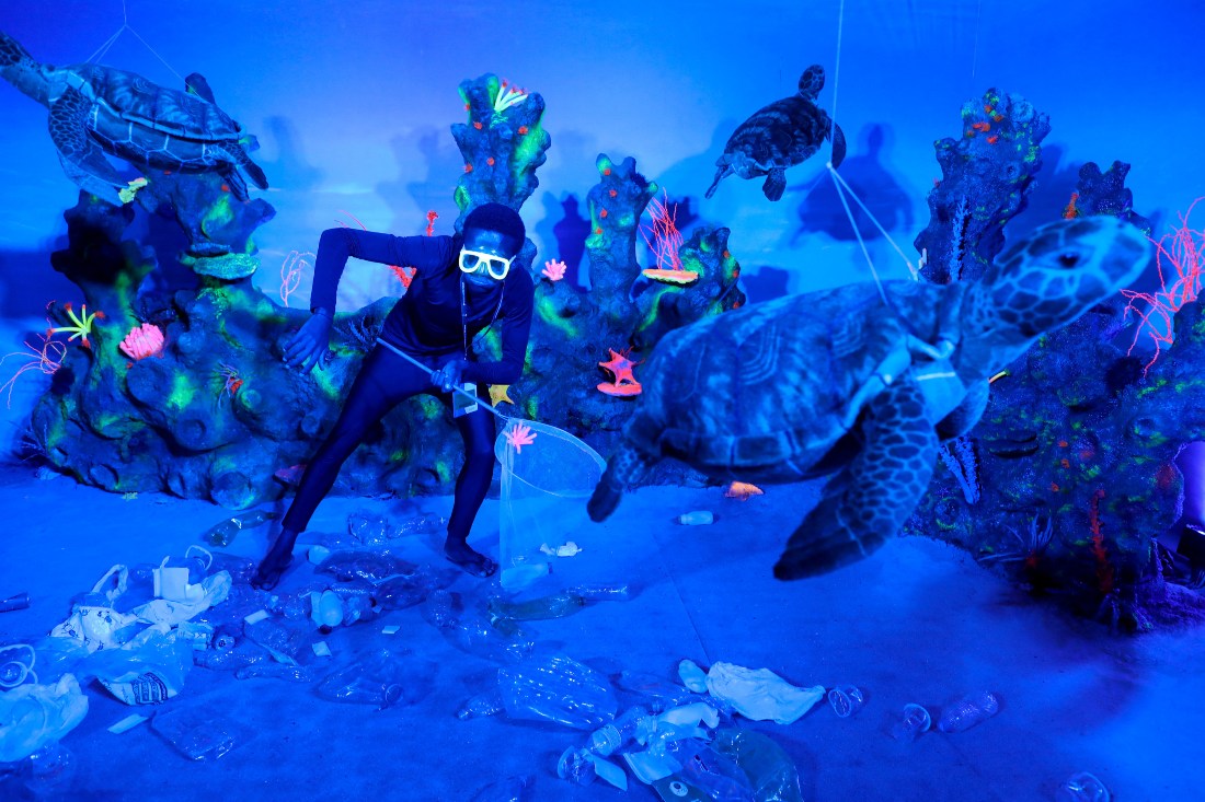 Picture taken in a space at the Citizen Village where visitors can pretend they help clean the ocean, during the 8th World Water Forum taking place in Brasilia, on March 20, 2018. (AFP)