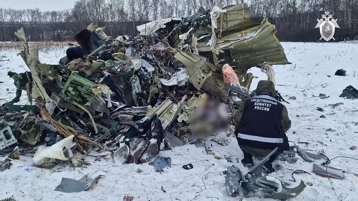 This grab taken from a handout footage released by the Russian Investigative Committee on Jan. 25, 2024 shows what investigators say is the Russian IL-76 military transport plane crash site in the Belgorod region. (AFP)