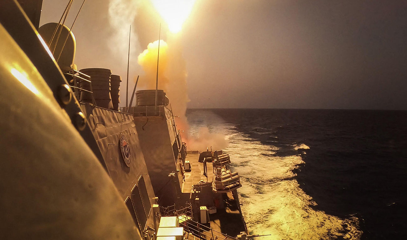 This handout picture courtesy of the US Navy taken on October 19, 2023 shows the Arleigh Burke-class guided-missile destroyer USS Carney (DDG 64) defeating a combination of Houthi missiles and unmanned aerial vehicles in the Red Sea. (AFP/File)