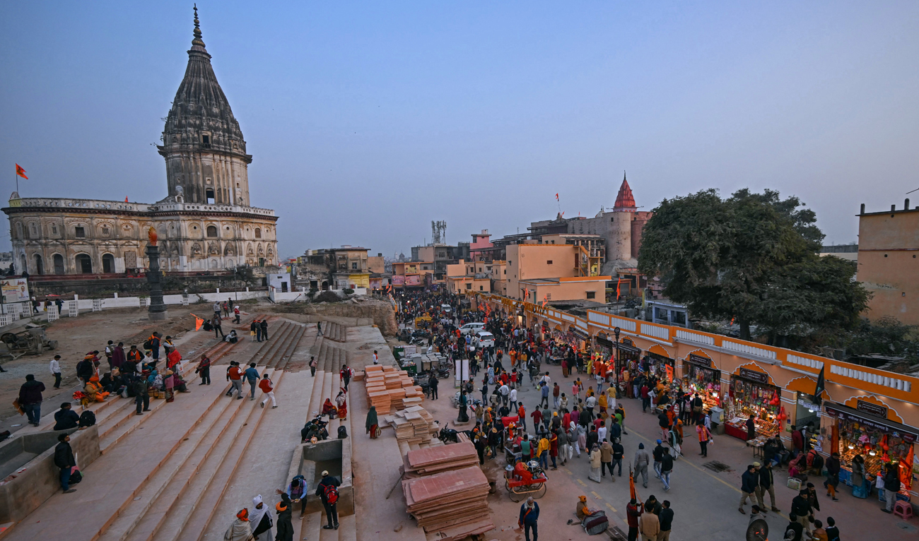 Hindu devotees walk towards the newly inaugurated temple of Hindu deity Ram in Ayodhya on January 23, 2024. (AFP)