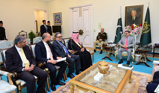 Caretaker Pakistan Prime Minister Anwaar-ul-Haq Kakar gestures during a meeting with Sheikh Abdulaziz Hamad Al-Jomaih, head of Al-Jomaih Holding Group, in Islamabad on January 25, 2024. (Photo courtesy: PMO)