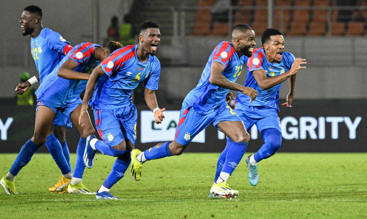 DR Congo's players celebrate after winning at the end of the Africa Cup of Nations (CAN) 2024 round of 16 football match between Egypt and DR Congo at the Stade Laurent Pokou in San Pedro on January 28, 2024. (AFP)