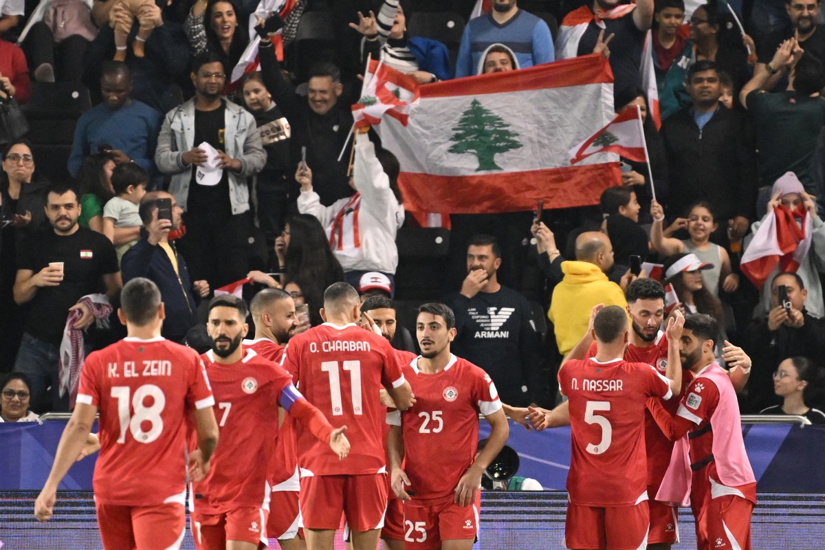 The Lebanese national team during the Qatar 2023 AFC Asian Cup Group A football match between Tajikistan and Lebanon at the Jassim bin Hamad Stadium in Doha on January 22, 2024. (AFP)
