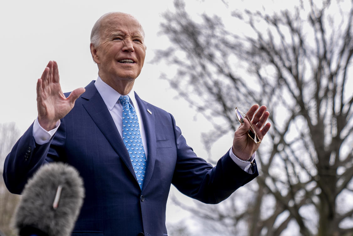President Joe Biden speaks to members of the media before boarding Marine One on the South Lawn of the White House in Washington, on Jan. 30, 2024. (AP)