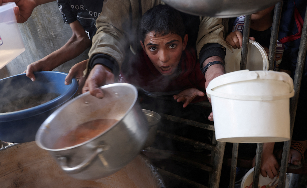 Federal government employees in the US are planning a “day of fasting for Gaza” on Thursday to protest at the response of President Joe Biden and his administration to the humanitarian crisis in Palestine. (Reuters/File Photo)
