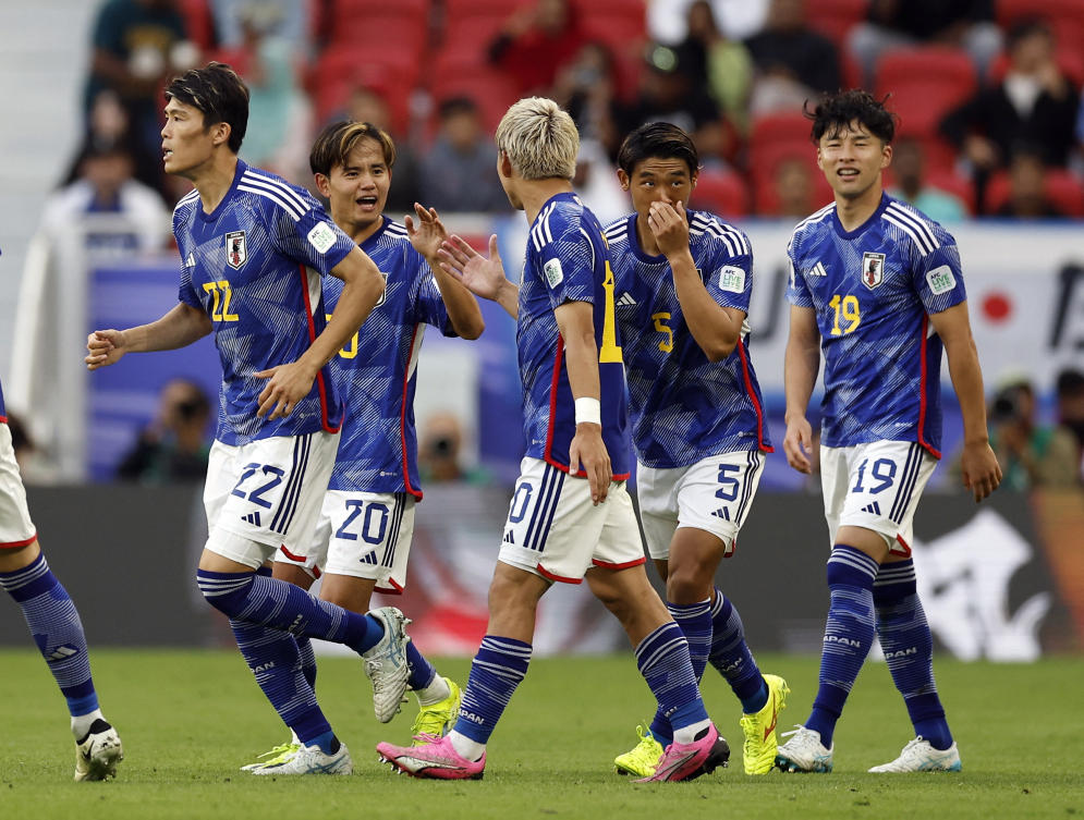 Japan’s Takefusa Kubo celebrates with teammates after scoring their second goal during their AFC Asian Cup — Round of 16 match against Bahrain at Al Thumama Stadium, Doha, on Jan. 31, 2024.(Reuters)