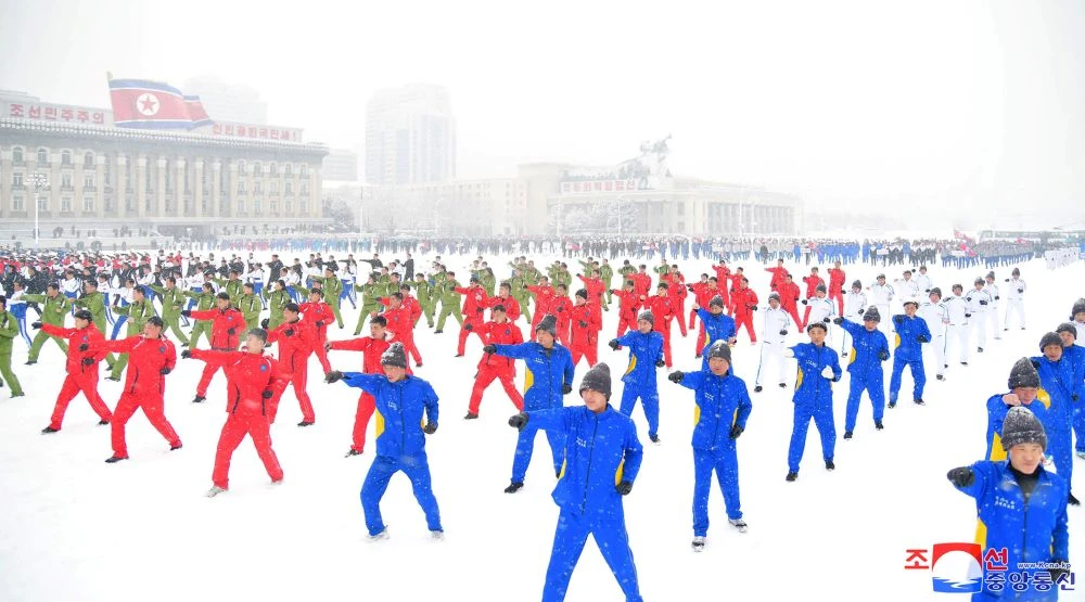 Civil servants of committees, provinces, and central agencies performing in Kim Il Sung Square to mark the first sports day of the new year, Pyongyang, North Korea, Jan. 14, 2024. (AFP)