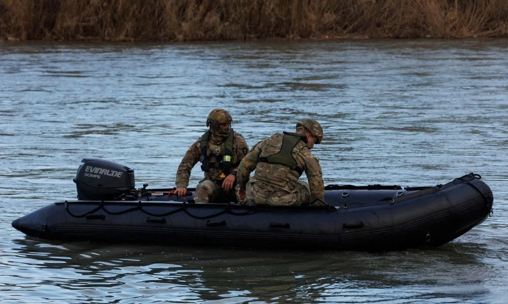 Texas National Guard soldiers patrol the Rio Grande near Shelby Park, Eagle Pass, Texas, Jan. 26, 2024. (AFP)