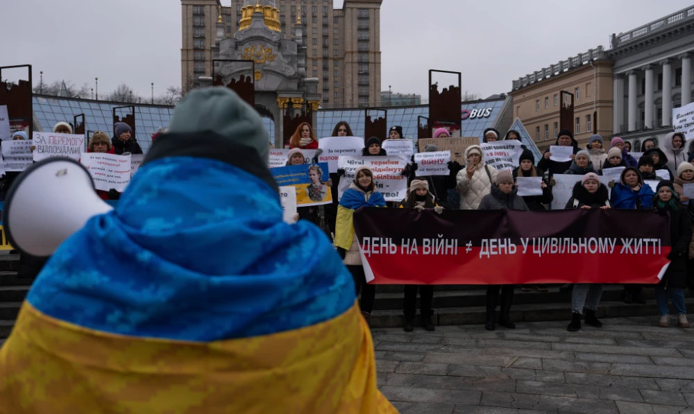 A protester speaks to the crowd, while attending a meeting on Independence square in Kyiv, Ukraine, Jan. 28, 2024. (AP)