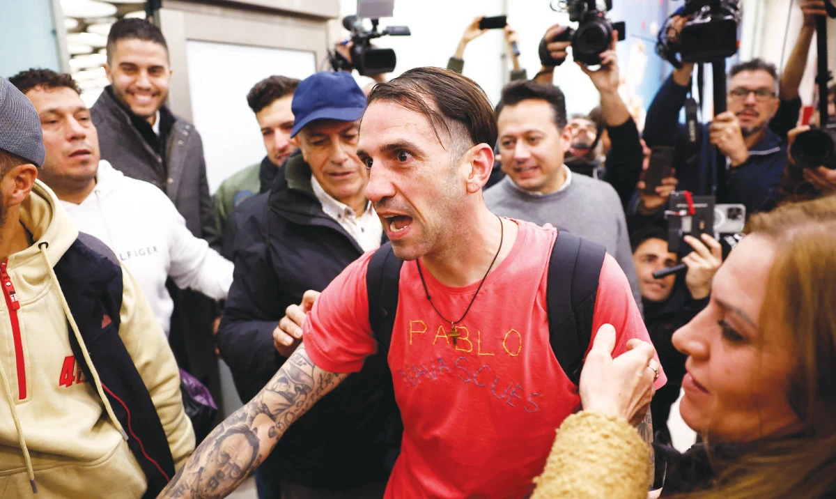 Spanish national Santiago Sanchez gestures on his arrival in Madrid following his release from Iranian prison, on Tuesday. (Reuters)