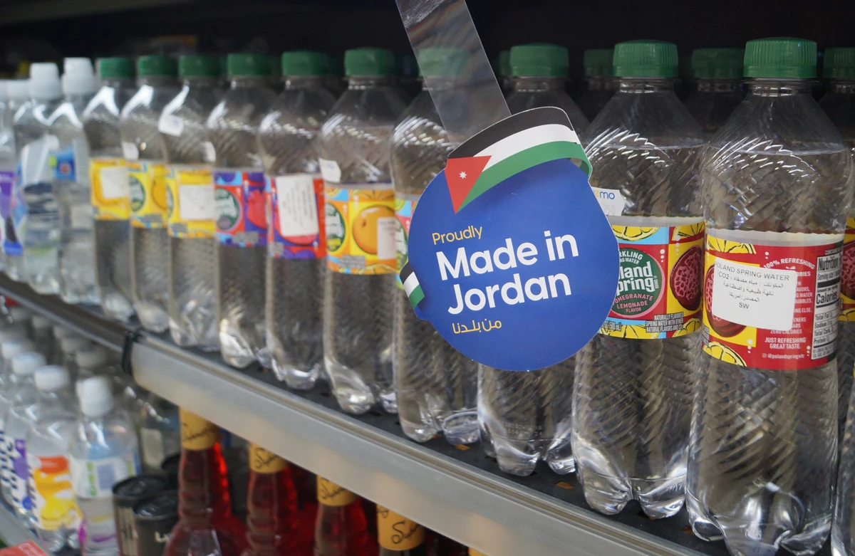 Jordanian beverages are labelled to help customers boycott Western products at Cozmo supermarket store in Amman. (AN Photo/Tamara Turki)