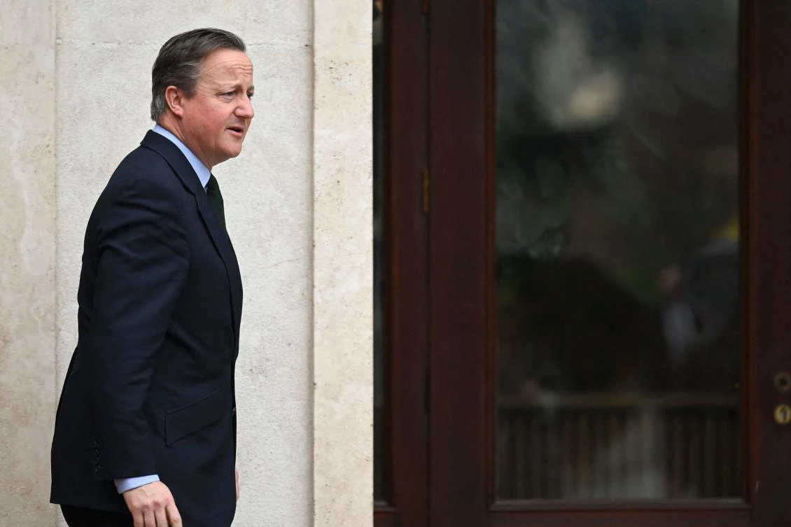 Britain's Foreign Minister David Cameron looks on after his meeting with Kosovo President, in Pristina, on January 4, 2024, during his first visit to Kosovo. (AFP)