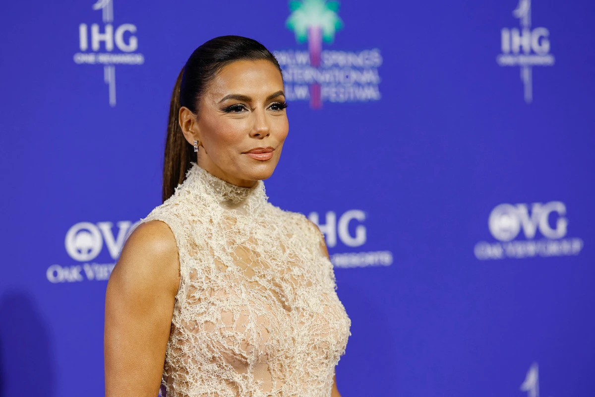The actress showed off her figure in an off-white floor-length sheer gown. (AFP)