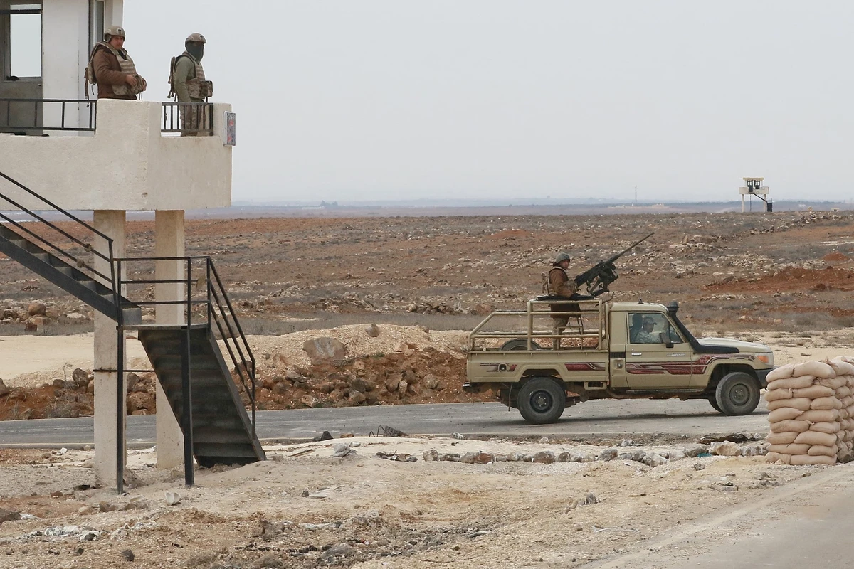 A picture taken during a tour origanized by the Jordanian Army shows soldiers patrolling along the border with Syria to prevent trafficking, on February 17, 2022. (AFP)