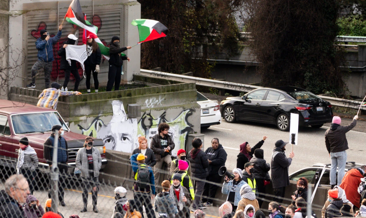 Protesters calling for a cease-fire in the Israel-Hamas war block Interstate 5 northbound, Saturday, Jan. 6, 2024 in downtown Seattle. (AP)