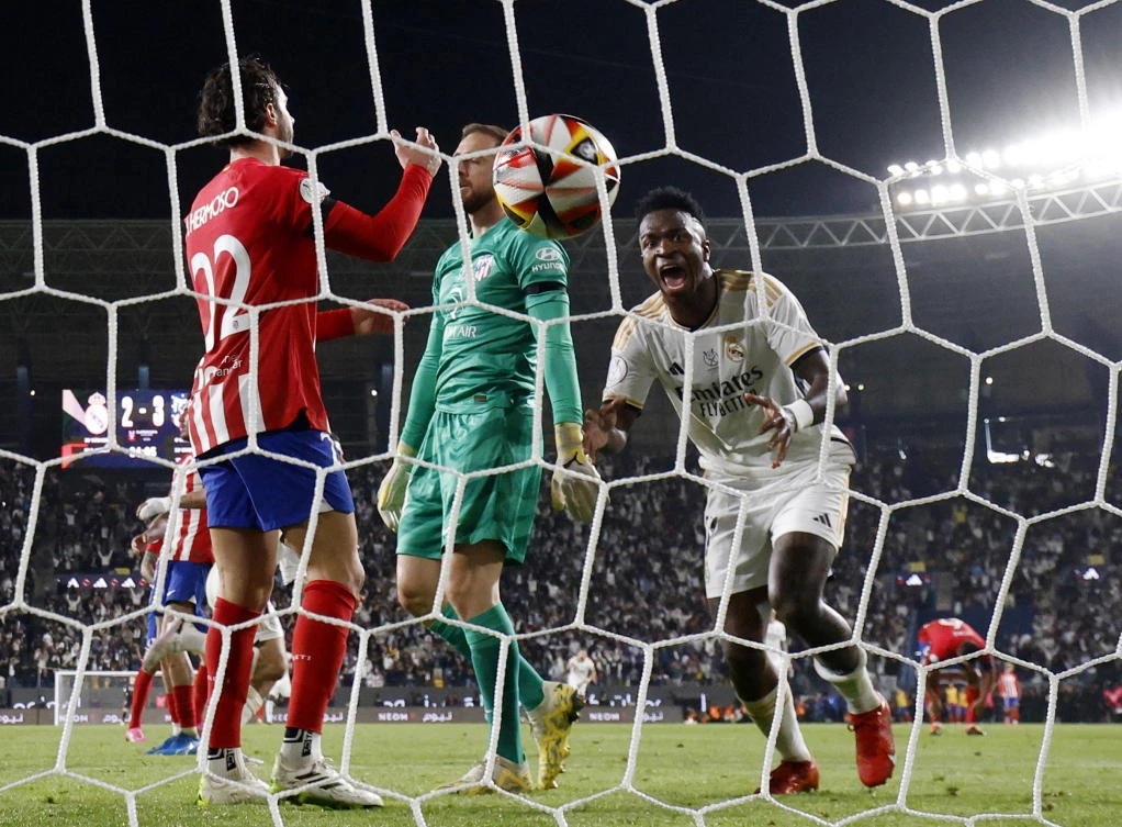 Real Madrid’s Vinicius Junior celebrates after Dani Carvajal scored their third goal during their Spanish Super Cup semifinal match against Atletico Madrid at Al-Awwal Park, Riyadh, on Jan. 10, 2024. (Reuters)