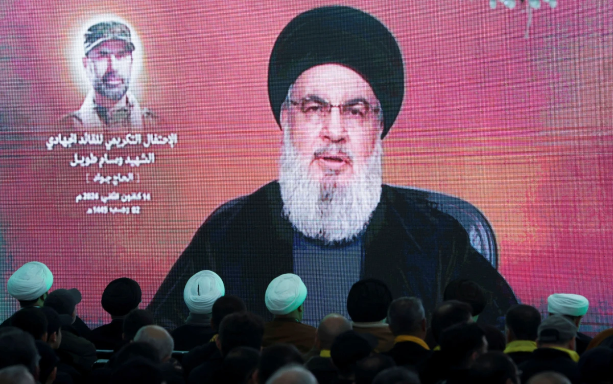 ebanon's Hezbollah leader Sayyed Hassan Nasrallah gives a televised address at a memorial ceremony to mark one week since the killing of Wissam Tawil, a commander of Hezbollah's elite Radwan forces, in Khirbet Silem, southern Lebanon, January 14, 2024. (REUTERS)