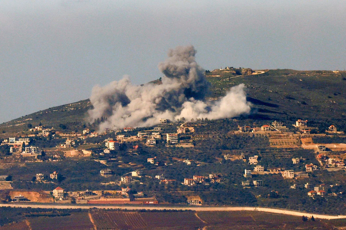 Smoke billows above the Lebanese village of Odaisseh during Israeli bombardment on January 18, 2024, amid ongoing cross-border tensions as the war between Israel and the Palestinian Hamas group in Gaza continues. (AFP)