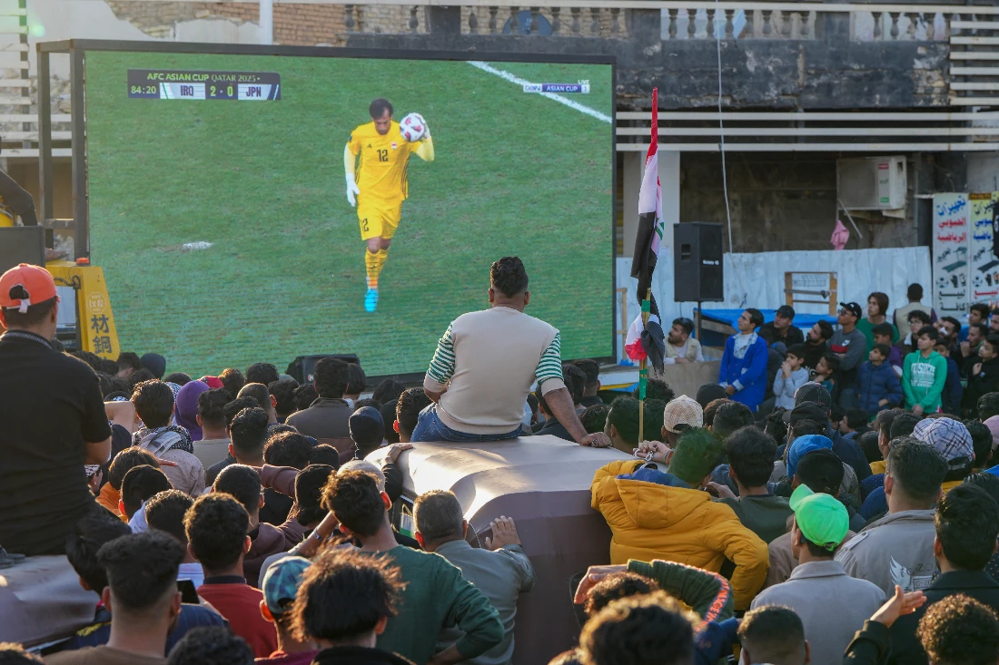 Iraqi fans watch their national team play against Japan in their Qatar 2023 AFC Asian Cup Group D football match. (File/AFP)