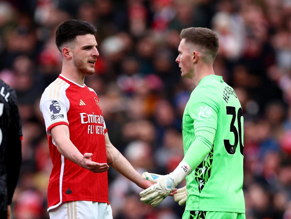 Arsenal’s Declan Rice speaks with Crystal Palace’s Dean Henderson after Gabriel scored their second goal during their Premier League match at Emirates Stadium on Jan. 20, 2024. (Reuters)