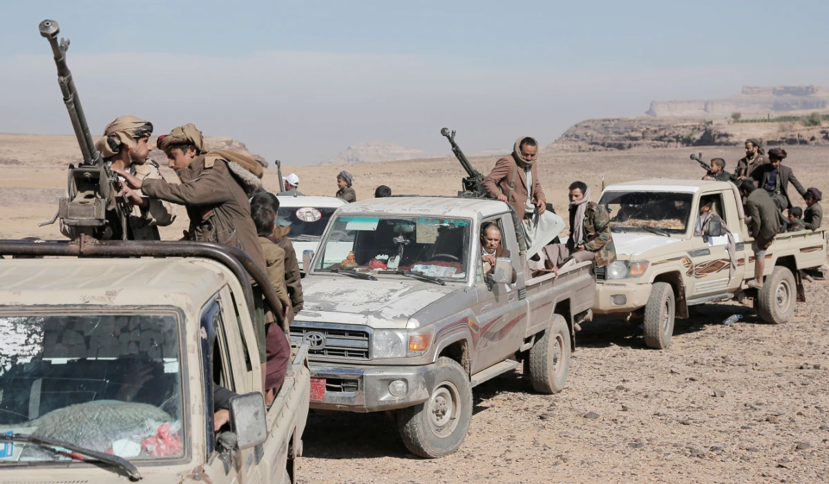Houthi fighters attend a rally of support for the Palestinians in the Gaza Strip and against the US strikes on Yemen outside Sanaa on Monday, Jan. 22, 2024. (AP)