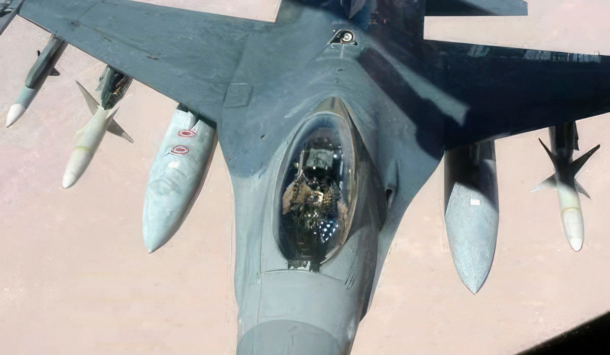 In this image provided by the US Air Force, Lt. Col. CQ Brown, Jr., pilots an F-16 Fighting Falcon in support of Operation Southern Watch, Iraq, in the early 2000s. (AP)