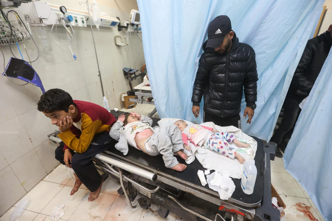 Palestinian children wounded in an Israeli strike receive treatment at Nasser Hospital in Khan Younis in the southern Gaza Strip, on Jan. 22, 2024. (Reuters)