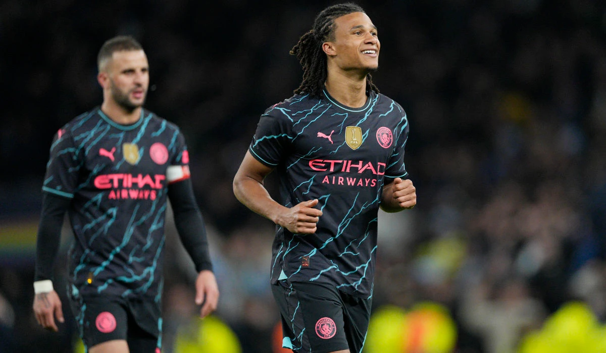 Manchester City's Nathan Ake reacts after the English FA Cup fourth round soccer match between Tottenham Hotspur and Manchester City in London, Friday, Jan. 26, 2024. (AFP)