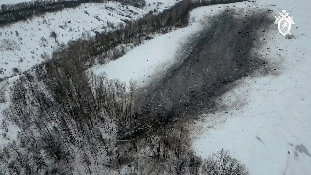 In this photo taken from video released by Russian Investigative Committee, the wreckage of the Il-76 is seen near Yablonovo, Belgorod region on Jan. 25, 2024. (AP)