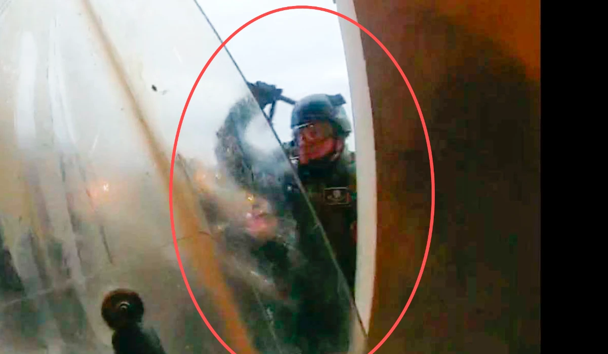 This image from police body-worn camera video, contained and annotated in the Justice Department's statement of facts, supporting the arrest warrant for Edward Richmond Jr., at the US Capitol on Jan. 6, 2021, in Washington. (AP)